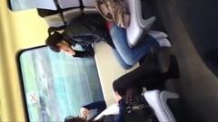 Girl in black tights and flats on train Thumb