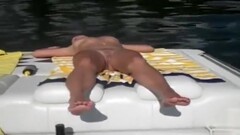 Naked woman sleeps on the boat as he films Thumb
