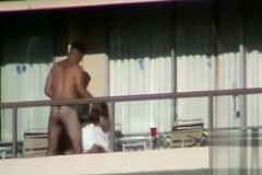 Couple has public sex on a hotel balcony Thumb