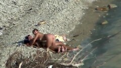 Lazy guy cums into a girlfriend's pussy on the nudist beach Thumb