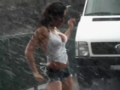 Stunning Latina babe has fun dancing in the rain Thumb