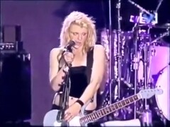 Hot rockstar plays a song with her boobs out in the open Thumb