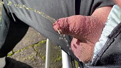 Morning piss in the sun with very small penis Thumb