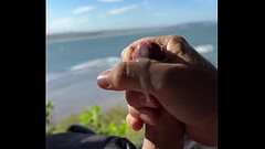 Boy cumming solo at beach slowmotion Thumb